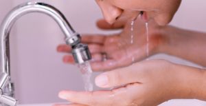 Person washing their face