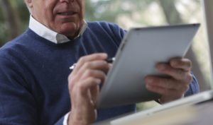 Man with computer tablet