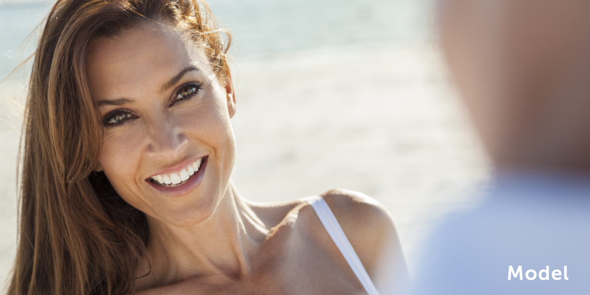 Woman Smiling, Her Neck in Profile